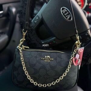 Coach Black Shoulder Bag with Gold Accents